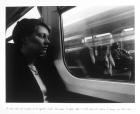 The train slows and lengthens as we approach London. I am about to meet - what? I will sit still before I emerge into that chaos...